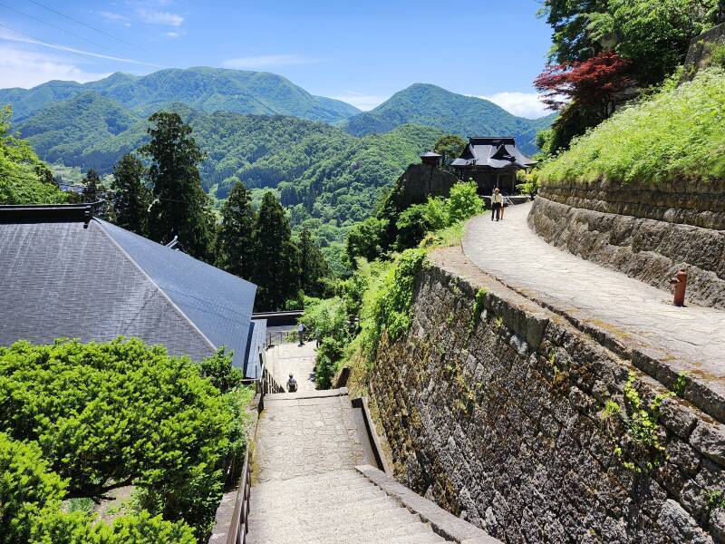 View of Nōkyō-dō and Kaizan-dō while climbing the thousand stone steps at Yamadera.