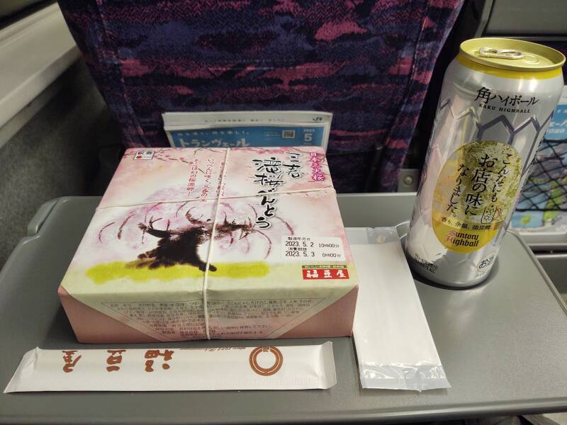 Opening a bentō lunch on board the Shinkansen.