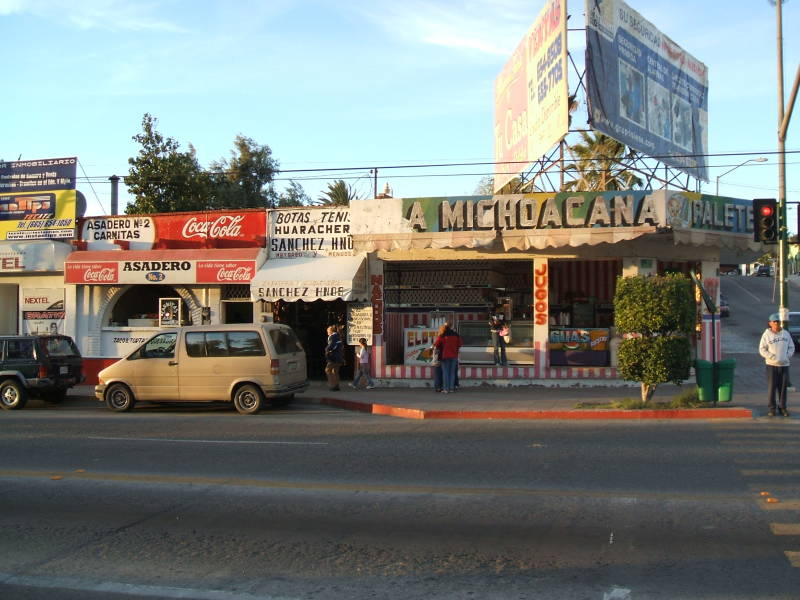 Small businesses along the street in Tecate, Mexico.