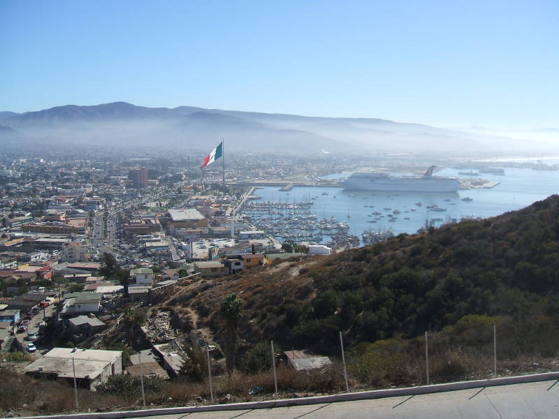 View of Ensenada harbor from Colinas de Chapultepec: enormous flag pole, cruise ship.