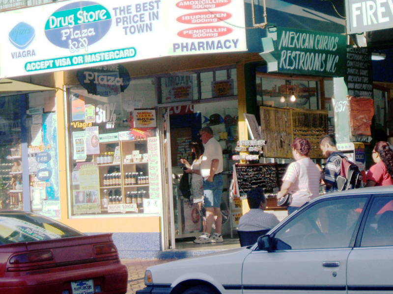 Ugly Americans buying a mariachi hat and erection meds in Ensenada.