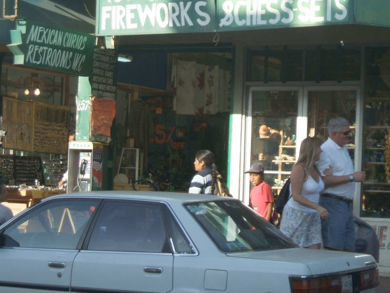 Ugly Americans buying a mariachi hat and erection meds in Ensenada.