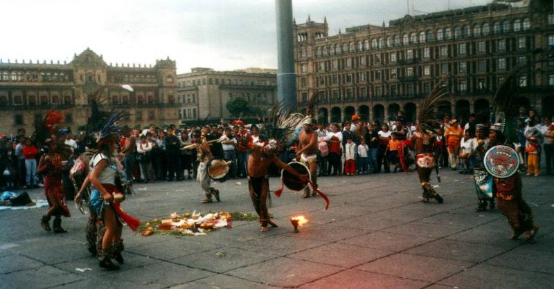 Native dancers with drums and torches on the Zócalo in Mexico City.