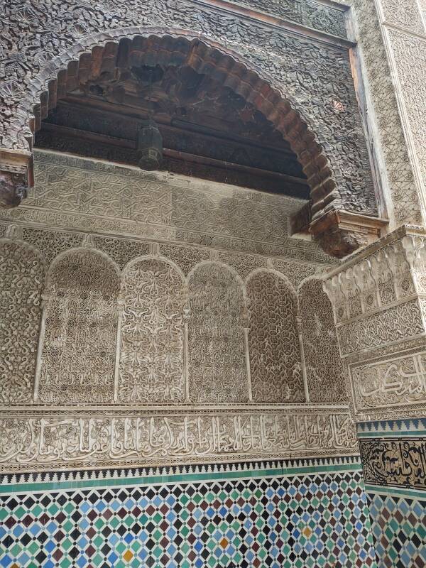 Elaborately decorated arched niche in the al-Attarine Madrasa in Fez el Bali medina.