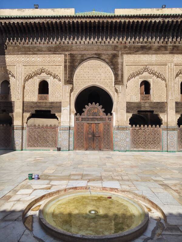 Looking back across the courtyard to the entrance of the Bou Inania Madrasa in Fez.