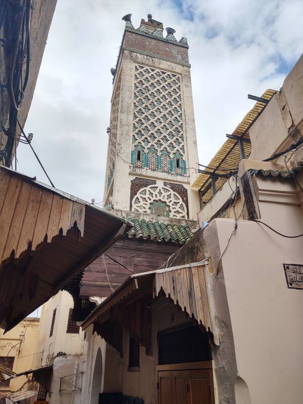 Minaret of the Chrabliyine Mosque, along Tala'a Kebira through the medina of Fez el Bali.