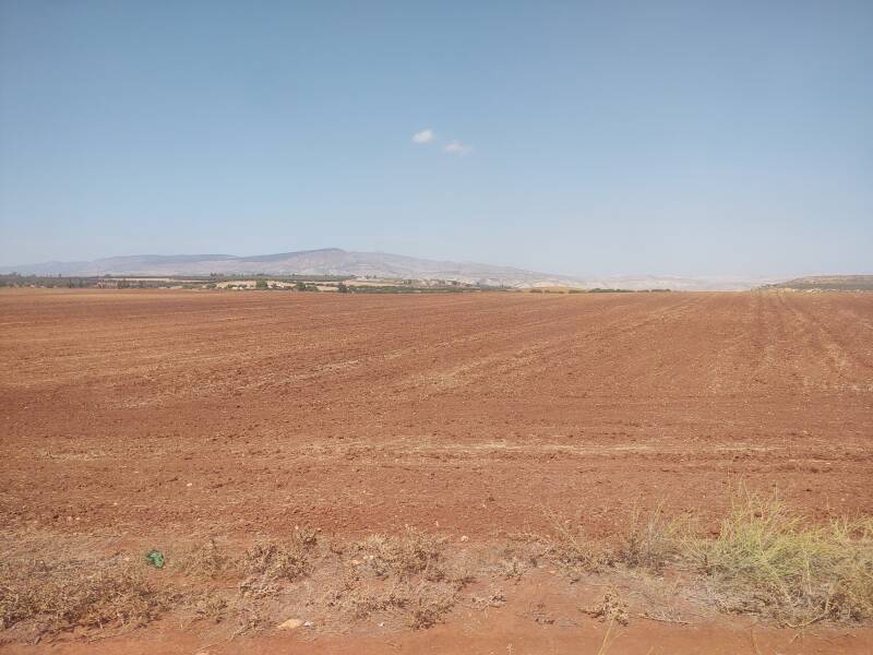 Plowed farm field seen from the train from Meknès to Fez in Morocco.