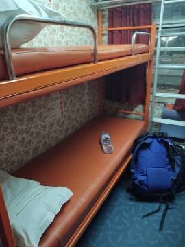 Shared compartment in an overnight couchette sleeper train from Tangier to Marrakech.