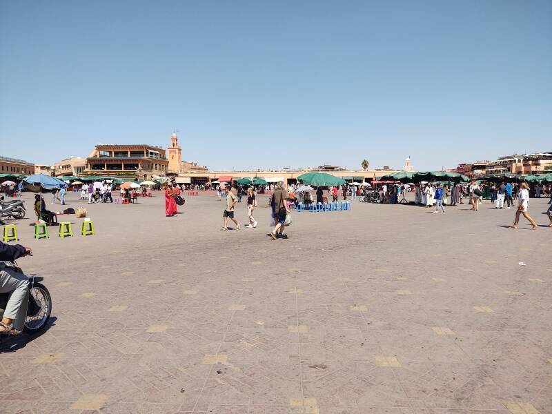 ALT: Afternoon on Sāḥat Jāmi' al-Fanā', or The Mosque at the End of the World, in central Marrakech.