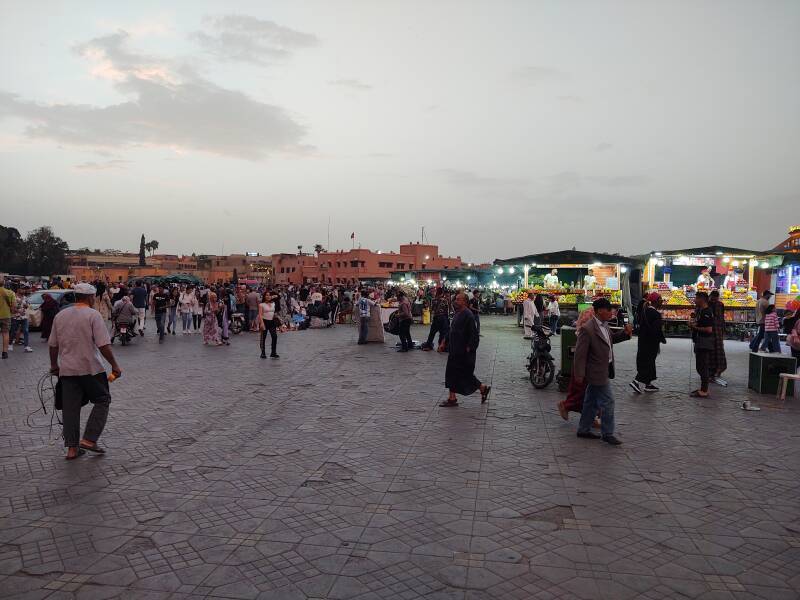 Juice stands light up in early evening on Sāḥat Jāmi' al-Fanā', or The Mosque at the End of the World, in central Marrakech.