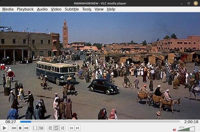 ALT: Jemaa el-Fnaa square as seen in Alfred Hitchcock's 1956 movie 'The Man Who Knew Too Much', 00:08:27.