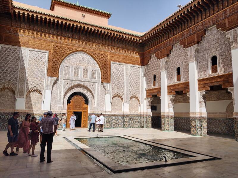 Central courtyard and fountain in the Ben Youssef madrasa in the medina of Marrakech.