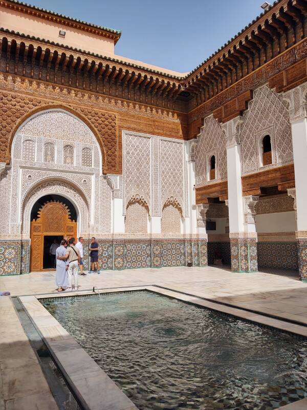 Central courtyard and fountain in the Ben Youssef madrasa in the medina of Marrakech.