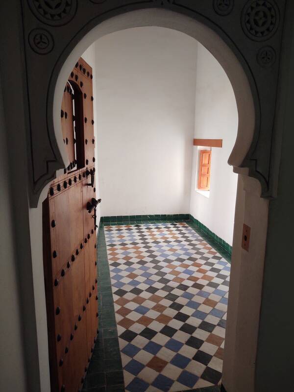 Entering a student's room in the Ben Youssef madrasa in the medina of Marrakech.