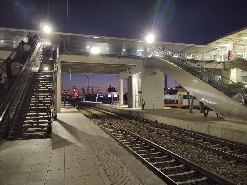 Changing trains at Kénitra, crescent moon in the distance. By overnight train to Marrakech.