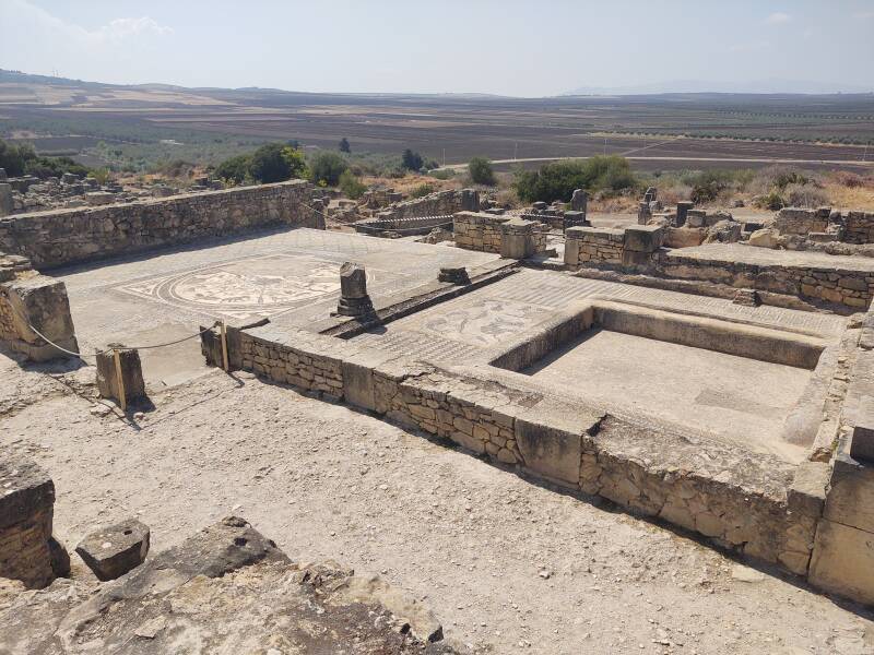 Mosaic and pool with triclinum at Volubilis archaeological site in Morocco.