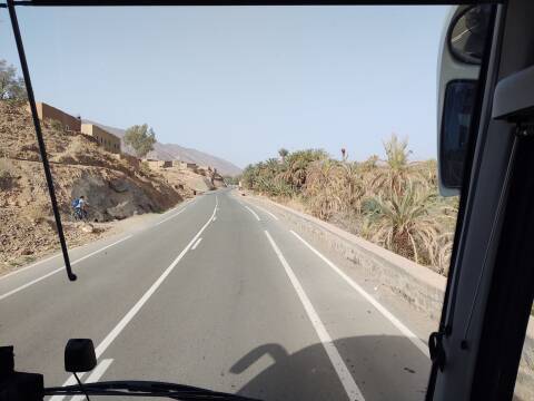 View from the front seat in the bus as we drive north up the Draa valley on the way from M'Hamid to Marrakech.