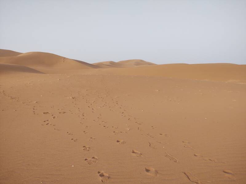 Footsteps in the sand at Erg Chigaga.