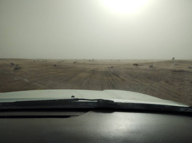 Driving through haze and fine desert dust on the way from Erg Chigaga to M'Hamid.