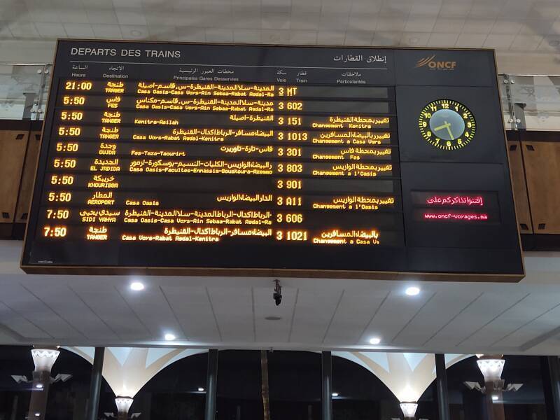 Schedule board in the Marrakech train station showing the departure of the sleeper train to Tangier.