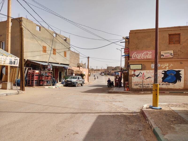 Walking east along the main street through M'Hamid.