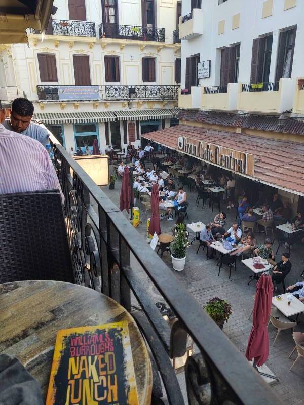 Mint tea and 'Naked Lunch' on the balcony of the Fuentes café, overlooking the Gran Café Central on the Souk Dakhli or Petit Socco.