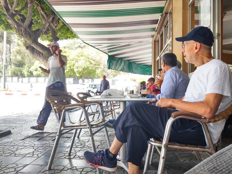 Sidewalk tables at Gran Café de Paris on the traffic circle at the end of Boulevard Pasteur in Tangier.