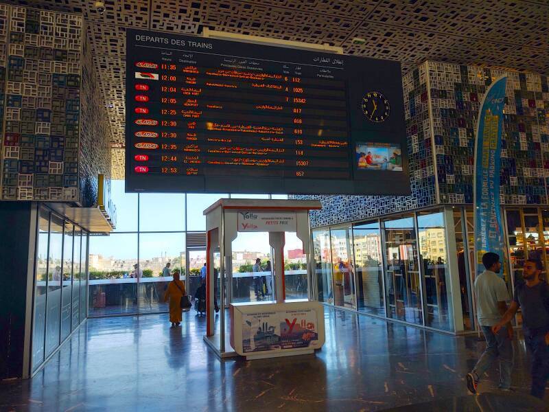 Departure schedule board at Gare Casa Voyageurs in Casablanca.