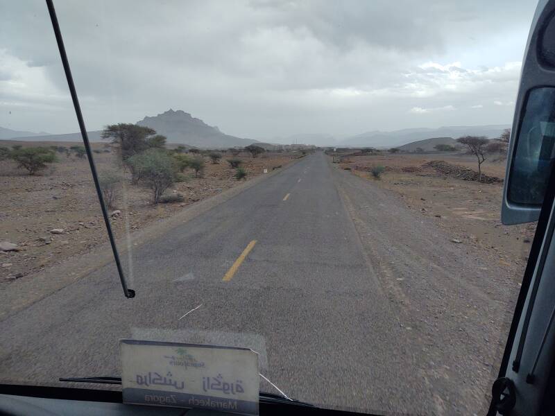 Djebel Kissane or Kissane Mountain in the distance on the highway approaching Agdz, traveling by bus from Marrakech to Zagora.