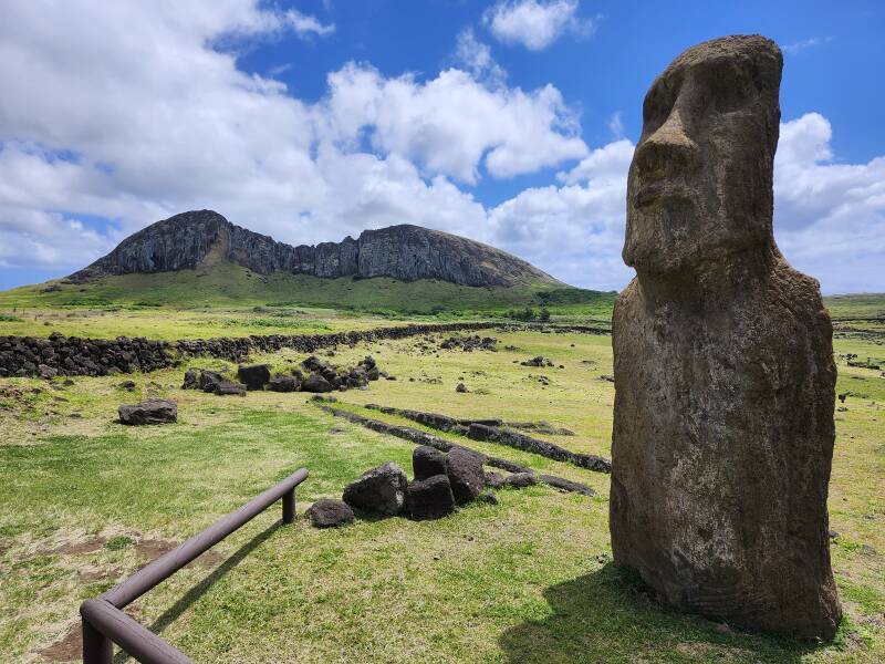 Lone mo'ai at Ahu Toŋariki, with Rano Raraku in the distance.