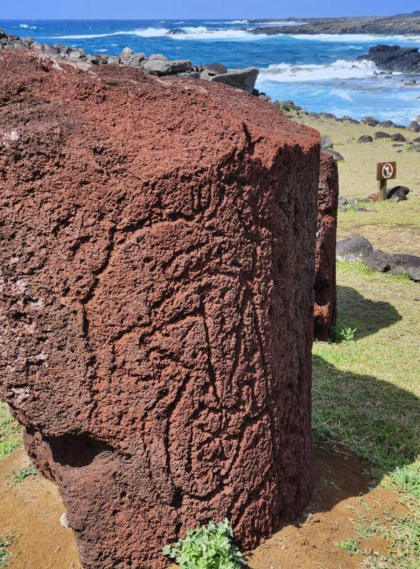 Red scoria with petroglyphs.