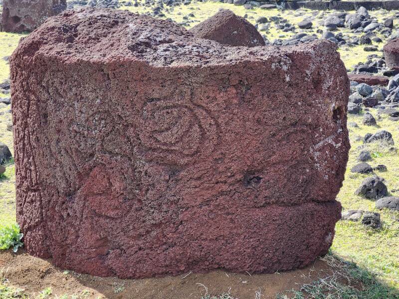 Red scoria with petroglyphs.