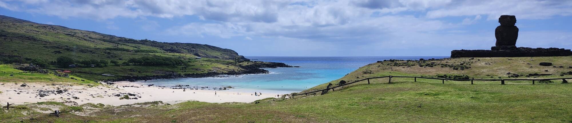 Mo'ai overlooking the white coral sand beach at Anakena.