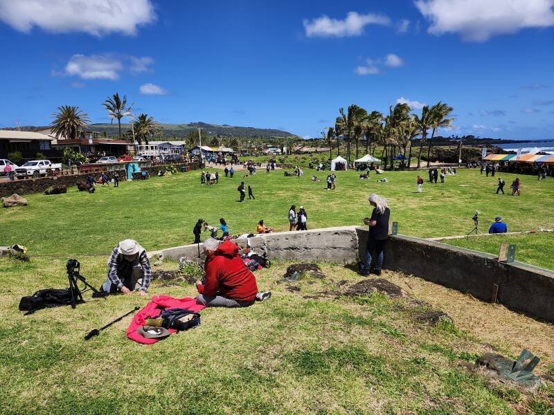 Crowd dispersing in the park along the waterfront in Hanga Roa, Rapa Nui.