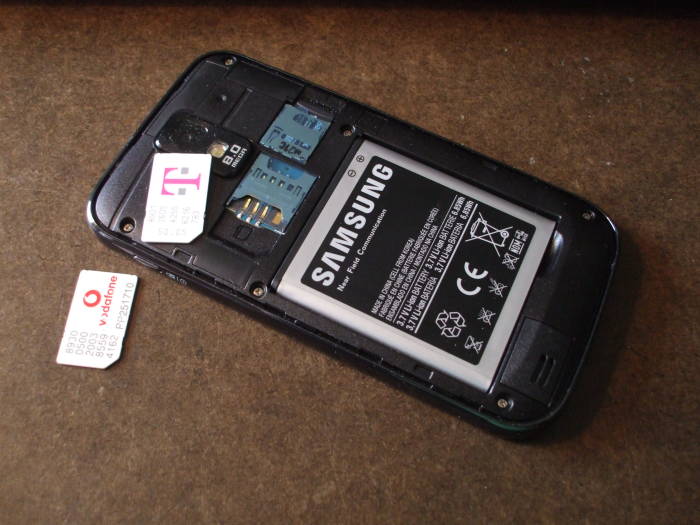 Replacing a SIM card in a mobile phone.