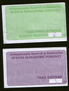 Tickets for entry and photographic permission in a monastery in northern Romania.