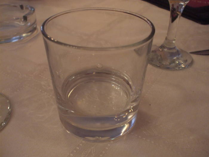 Glass of ţuică in Transylvania.