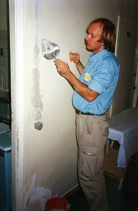 Repairing plaster walls in the hospital
