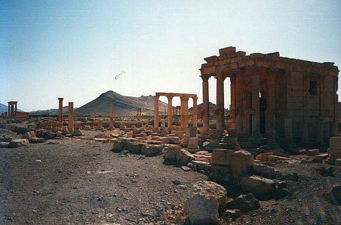 Ruins at Palmyra (Tadmur), Syria: view southwest across the center of the city toward some distant hills.