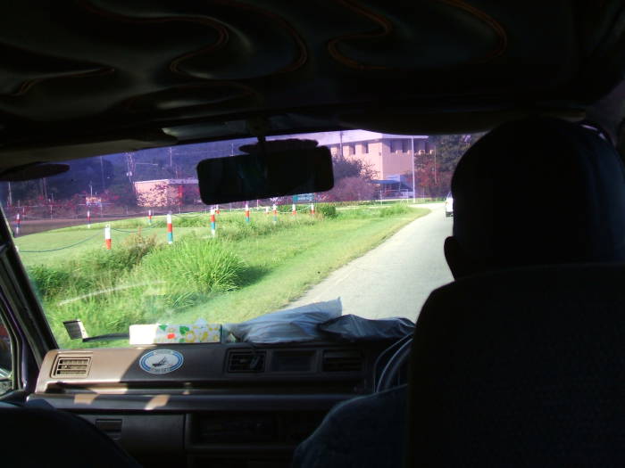 A view from inside a maxi-taxi (or shared van) in Trinidad.