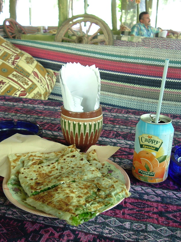 Turkish meal of lentil soup, salad, and plav.