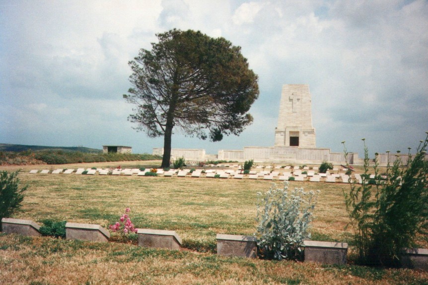 The cemetery and large memorial or monument at Lone Pine, on the Gallipoli battlefields.  Marker with Atatürk's speech, 'Those heroes that shed their blood and lost their lives... you are now lying in the soil of a friendly country.  There is no difference between the Johnnies and the Mehmets where they lie side by side here in this country of ours. You the mothers who sent their sons from far away countries, wipe away your tears. Your sons are now lying in our bosom and are in peace. Having lost their lives on this land they have become our sons as well.'