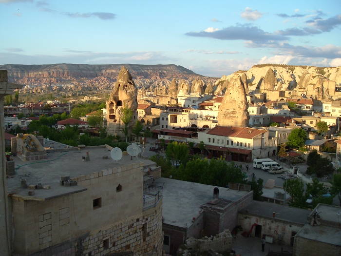 Sunset view over rock towers in Göreme, in Cappadocia, Turkey.