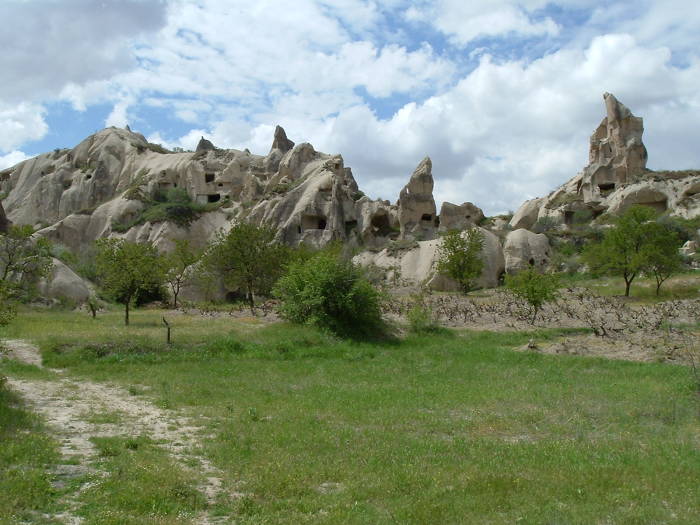 Thousand year old stone carved cave homes and monasteries outside Göreme, in Cappadocia, Turkey.