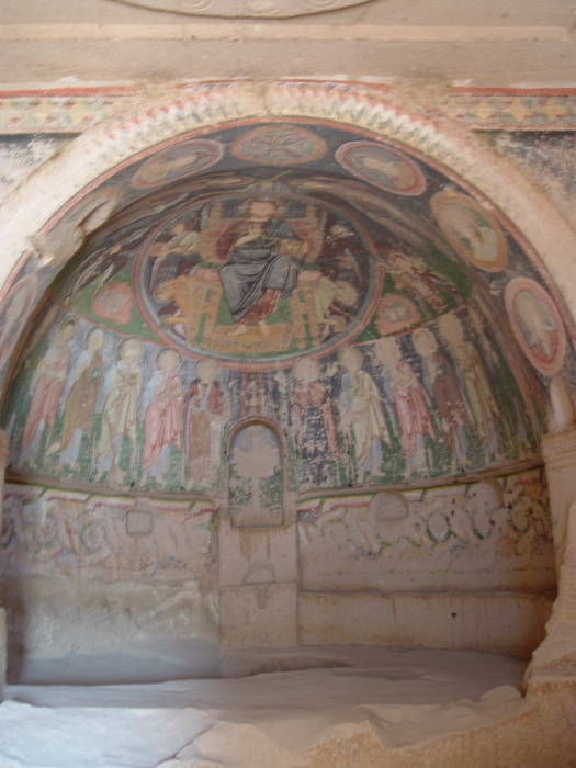 Frescos above altar area inside Haçlı Kilise or the Church of the Cross, north rim of Red Valley, near Rose Valley, outside Göreme, in Cappadocia, Turkey.