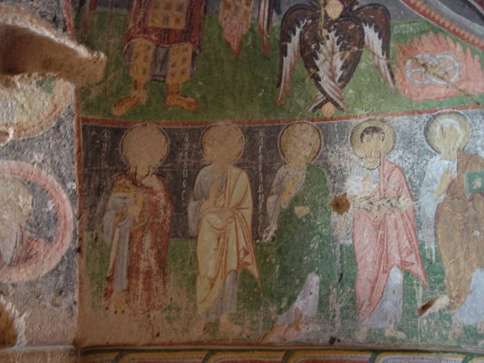 Frescos above altar area inside Haçlı Kilise or the Church of the Cross, north rim of Red Valley, near Rose Valley, outside Göreme, in Cappadocia, Turkey.