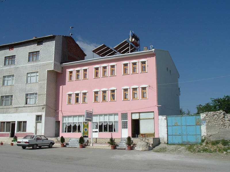 Hattusas Baykal Otel ve Pansiyon in Boğazkale, Turkey.  A bright pink hotel.