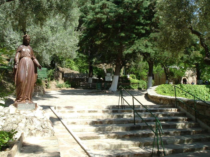 Statue and outdoor chapel at Maryemana Evi, the Virgin Mary's home.