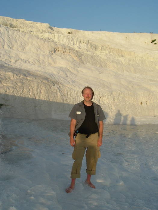 Walking barefoot on the white flowstone formations at Pamukkale.