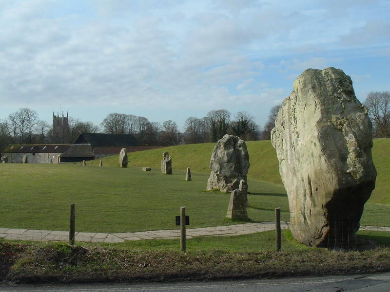 Large megaliths form the Outer Circle, the main ring of the Avebury stone circle.
